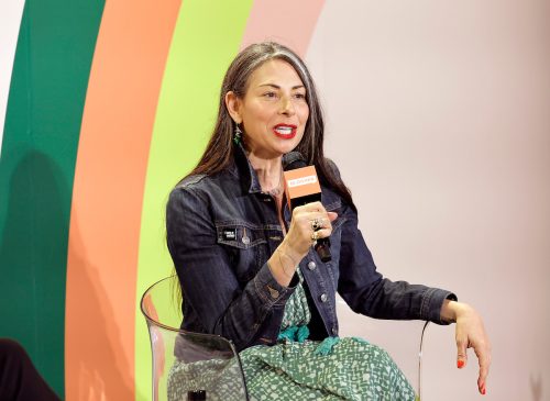 Stacy London speaking on stage