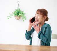 senior woman talking on phone and smiling