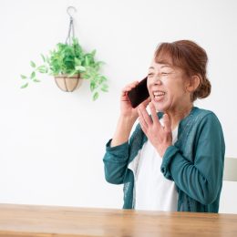 senior woman talking on phone and smiling