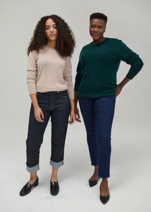 Women modeling Universal Standard cashmere sweaters.