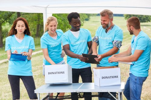 Five Volunteers Collecting Donations