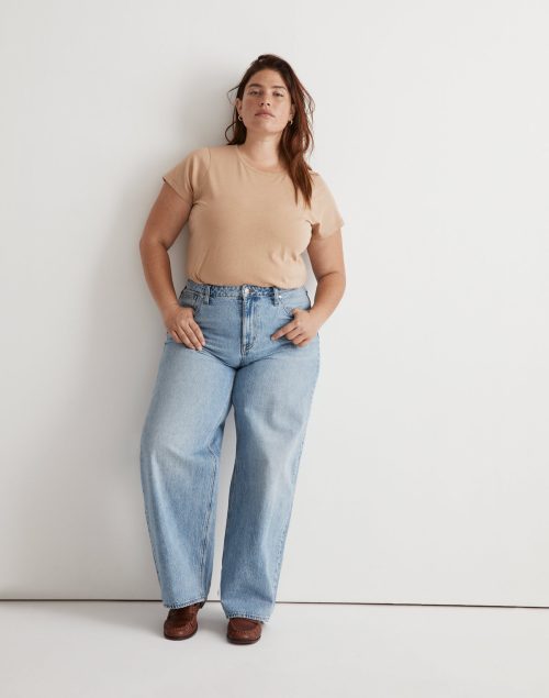 Model wearing Madewell plus size superwide leg jeans