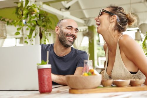 Two People Laughing at Lunch