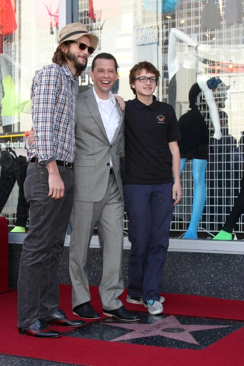 Ashton Kutcher, Jon Cryer, and Angus T. Jones in 2011