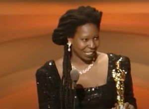 Whoopi Goldberg accepting her Oscar in 1991