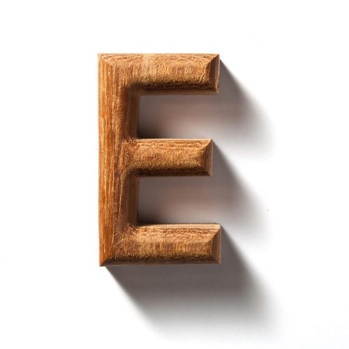 a wooden letter E