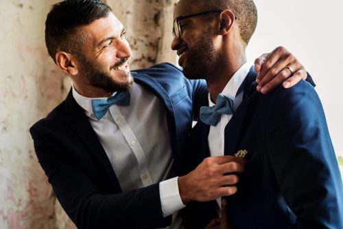 young gay couple married