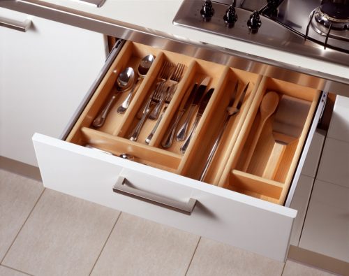 open kitchen drawer with utensils