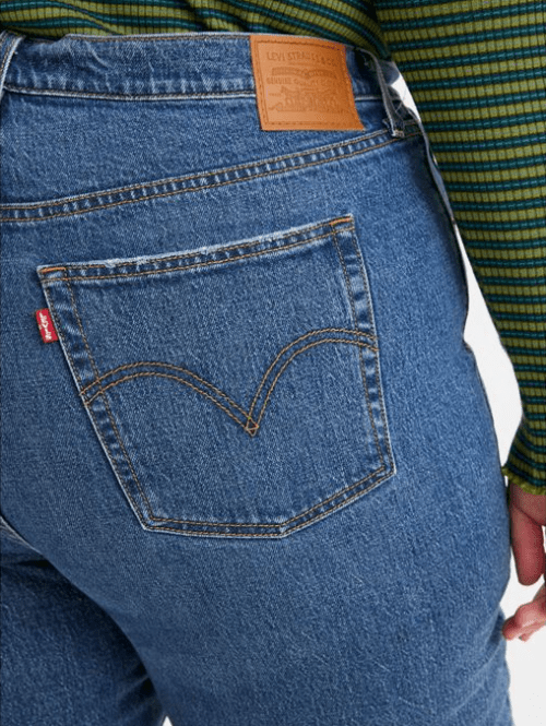 Close-up, rear-view product shot of model wearing Levi's Ribcage Straight Ankle Jeans