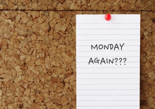 piece of paper on bulletin board that reads "monday again???"