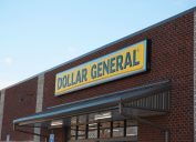 The front store sign of a Dollar General in the morning light.
