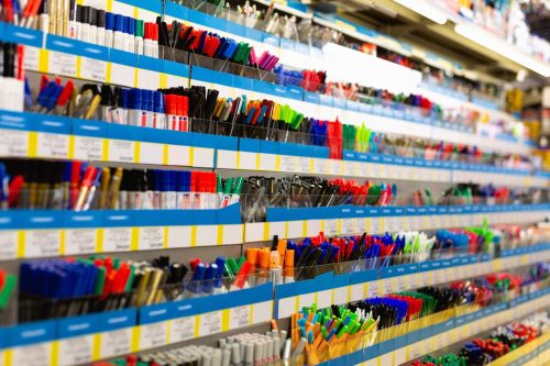 Colorful beautiful pen shelves in office supply store