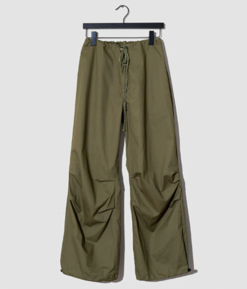 Product shot of OneDNA parachute pants in olive green