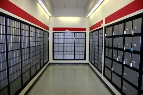 Hallway of post office boxes.
