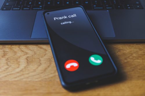 cell phone getting a call from a prankster