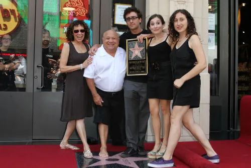 Rhea Perlman, Danny DeVito, and their children at DeVito's Hollywood Walk of Fame ceremony in 2011