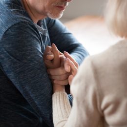 man apologizing to wife
