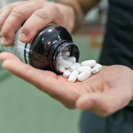 man taking energy pills