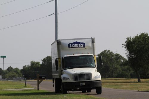 lowe's delivery truck parked