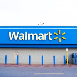 A closeup of a Walmart store sign