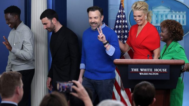 "Ted Lasso" cast members and press secretary Karine Jean-Pierre in the White House press room in March 2023