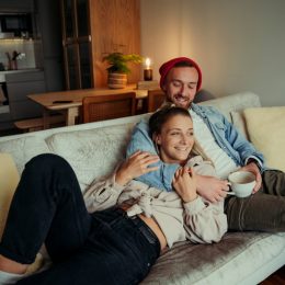Couple Cuddling on the Couch