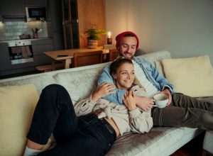 Couple Cuddling on the Couch