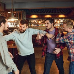 Group of Men Fighting