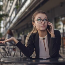 Woman on the Phone Rolling Her Eyes