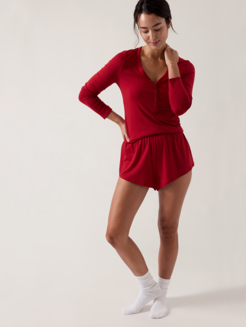 Model wearing Athleta's Nighttime Bliss pajamas in red