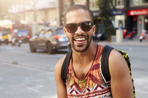 man in sun glasses happy about having a good nickname