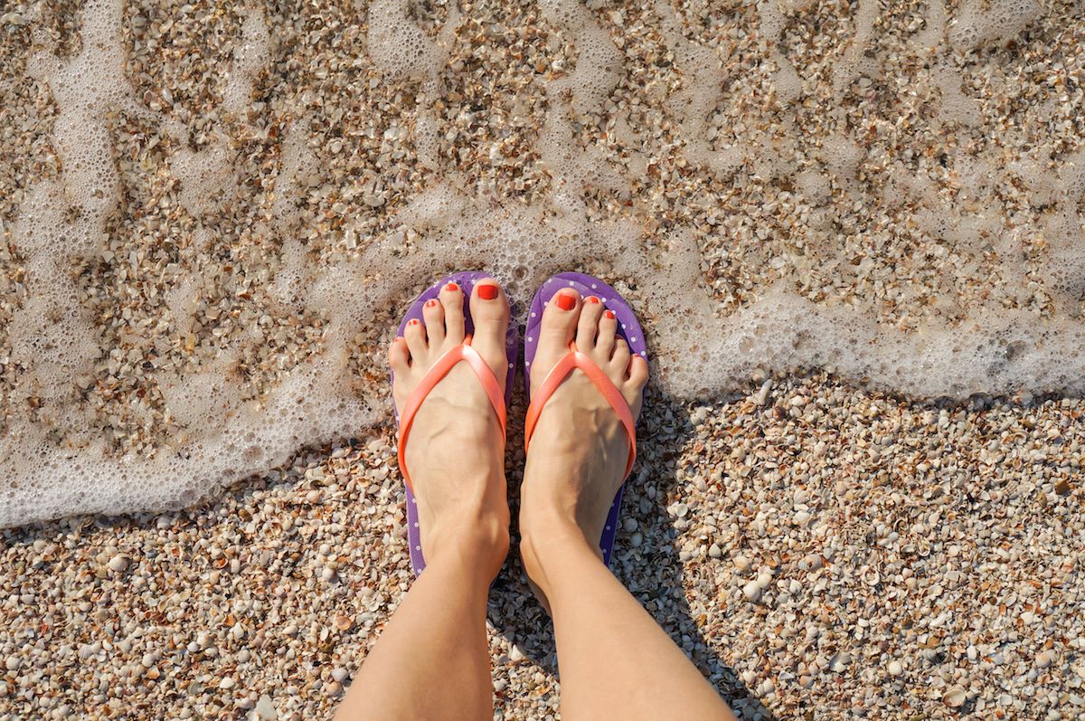 Flip flops with outlet flowers over toes