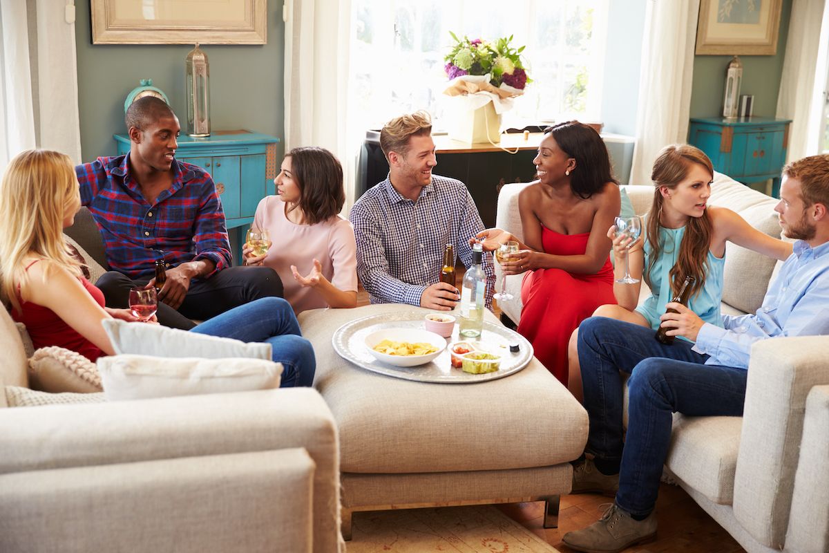 family sitting in living room