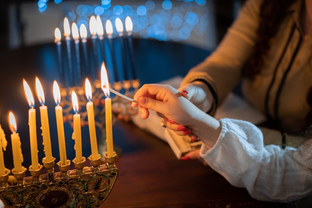 https://bestlifeonline.com/wp-content/uploads/sites/3/2023/04/hanukkah-facts.jpg?quality=82&strip=all