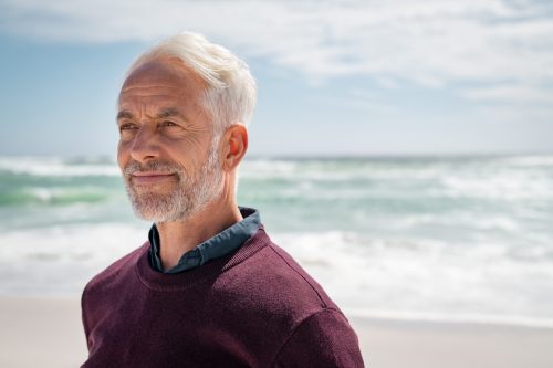 older man on the beach