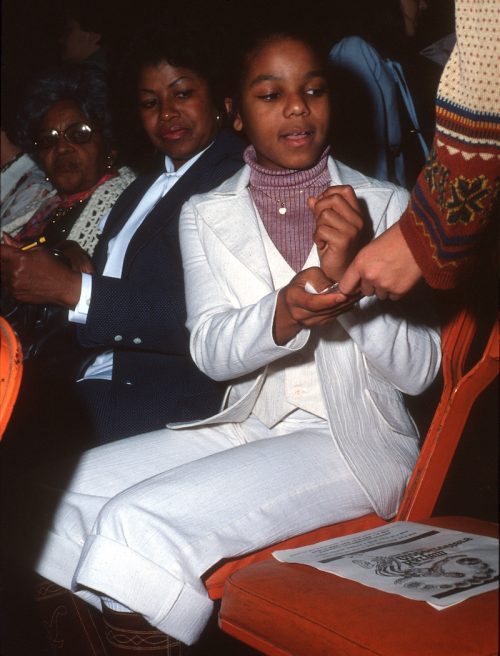 Janet Jackson signing an autograph in 1978