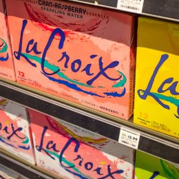 Boxes of La Croix on a shelf in a store