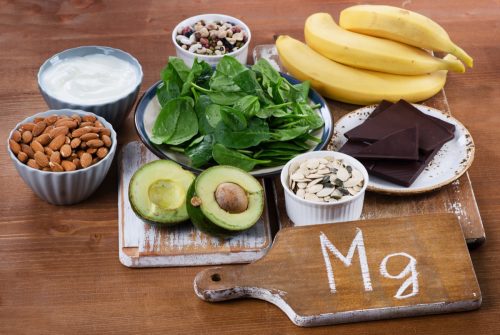 Foods High in Magnesium on wooden table. Healthy eating.