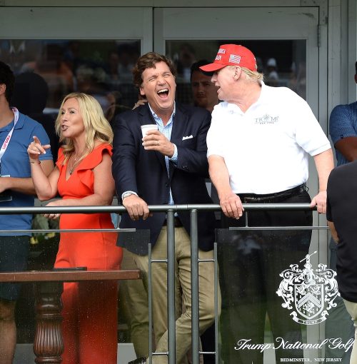 Tucker Carlson and Donald Trump at the Trump National Golf Club in 2022