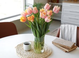 tulips in a vase on a table