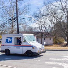 United States Postal Service van delivering mail in Buford, Georgia