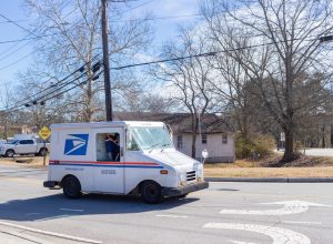 United States Postal Service van delivering mail in Buford, Georgia