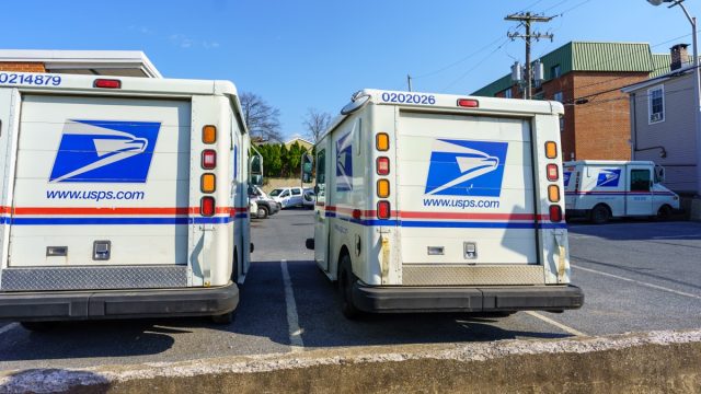 USPA Mail delivery trucks parked at the Ephrata Post Office in Lancaster County, PA.