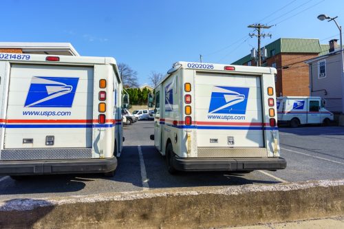 USPA Mail delivery trucks parked at the Ephrata Post Office in Lancaster County, PA.