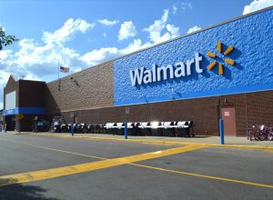 Walmart storefront. Walmart Inc. is American retail corporation operates a chain of hypermarkets, discount department and grocery stores.