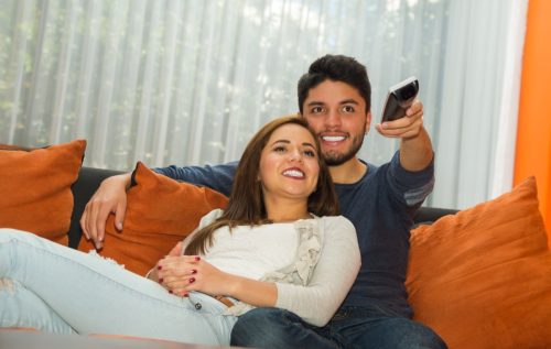 Couple Watching TV on the Couch