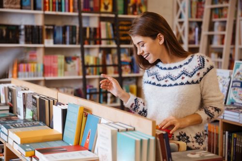 Girl Browsing in Bookstore