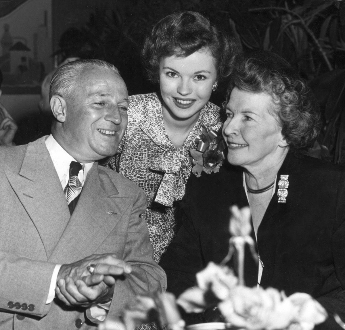 Shirley Temple with her parents George and Gertrude Temple in 1948