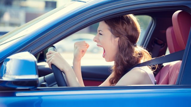 Woman Cursing at People From her Car
