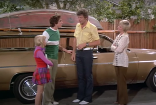 Susan Olsen, Barry Williams, Robert Reed, and Florence Henderson on "The Brady Bunch"